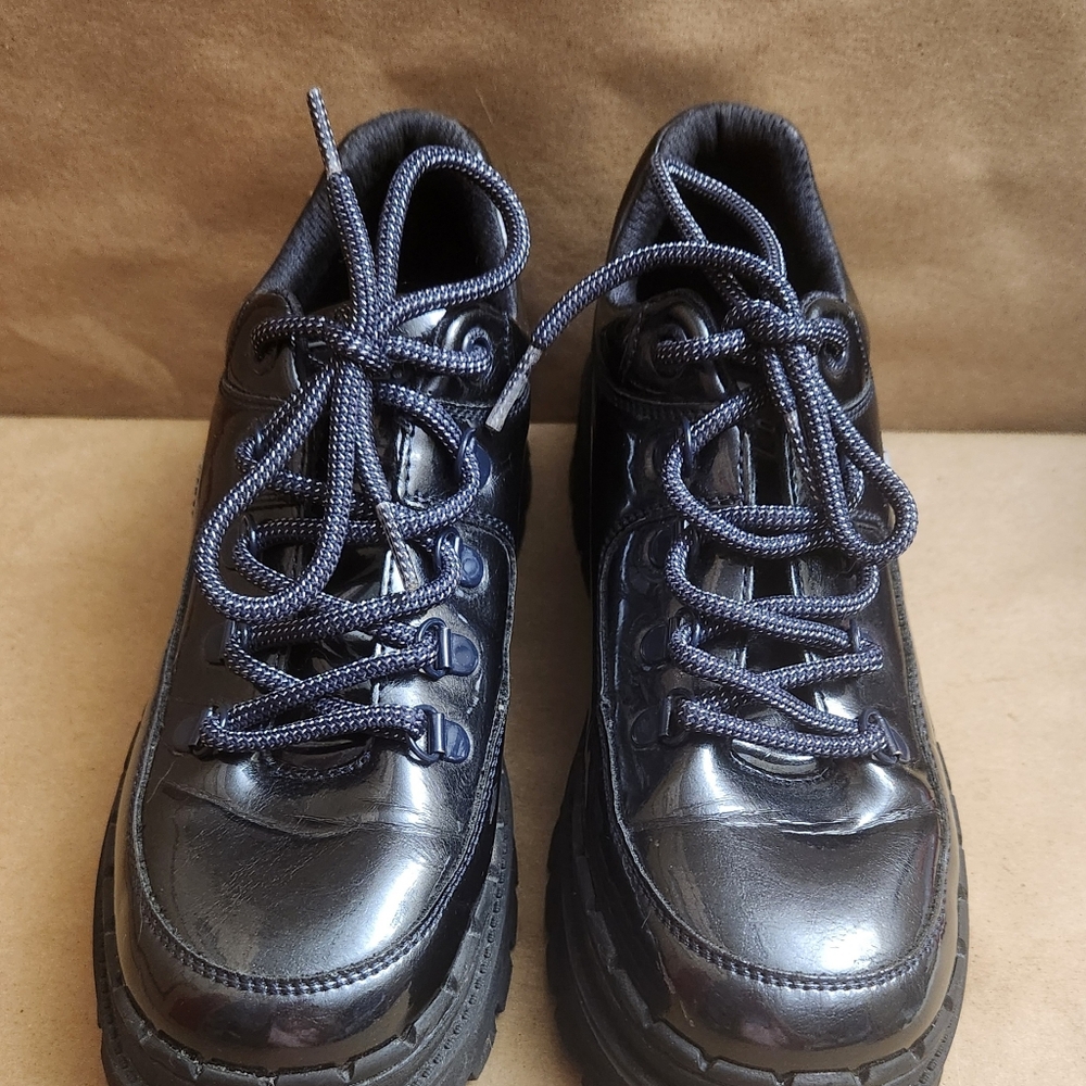 Skecher Jammers patent boots Black